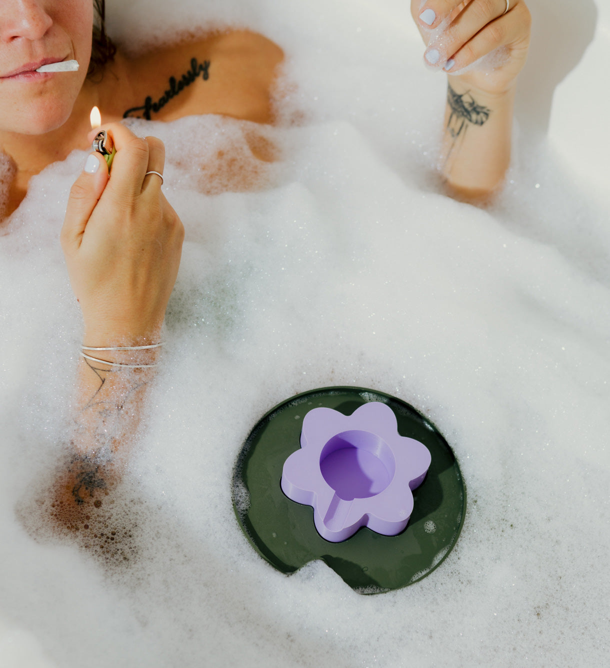 The Floating Ashtray floating in the bubble bath ready for the joint to be lit, and eventually be ashed into