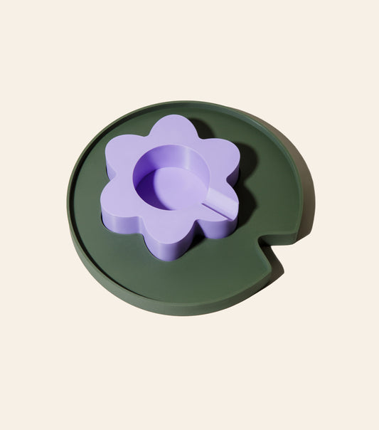 The 3D printed Floating Lilac Flower Ashtray complete with a ridge for your joint