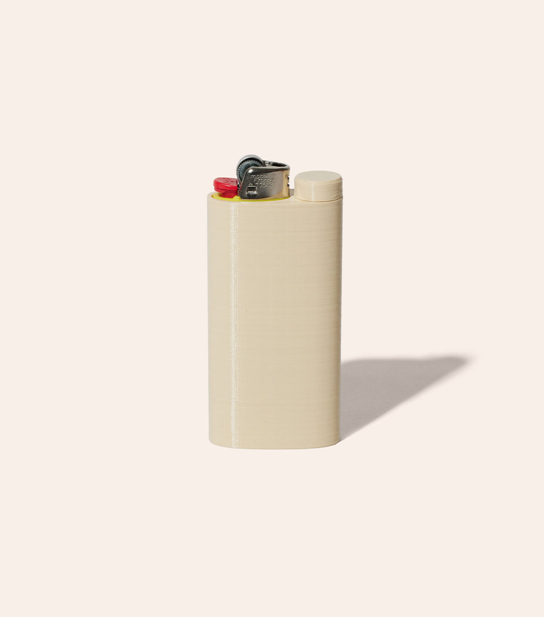 The Tan Jointlocker 1.0 with BIC lighter inserted into lighter case, and cap twisted onto protective joint holder