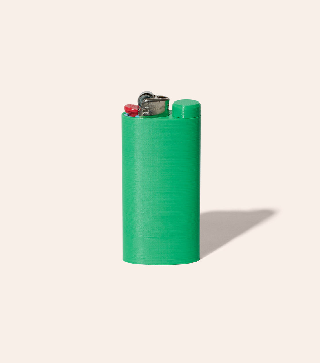 The Kelly Green Jointlocker 2.0 with BIC lighter inserted into case, and cap twisted onto joint holder area