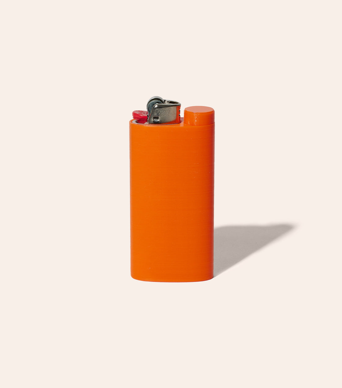 The Safety Orange Jointlocker 2.0 with BIC lighter inserted into case, and cap twisted onto joint holder area