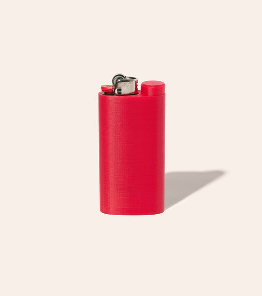 The Strawberry Red Jointlocker 2.0 with BIC lighter inserted into case, and cap twisted onto joint holder area